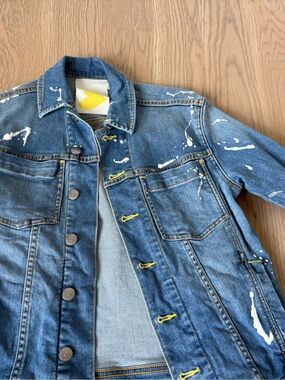 Kerry Rosenthal Is Here Denim Jacket with paint splatter and “Sunshine” on back